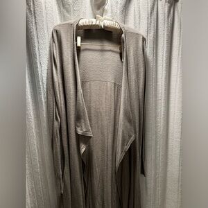 Chelsea and Theodore long sweater in gray. Wrap style. Has pockets. Cabincore